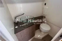 Bathroom interior of 2020 Capelli Tempest 40 boat with modern sink and toilet.