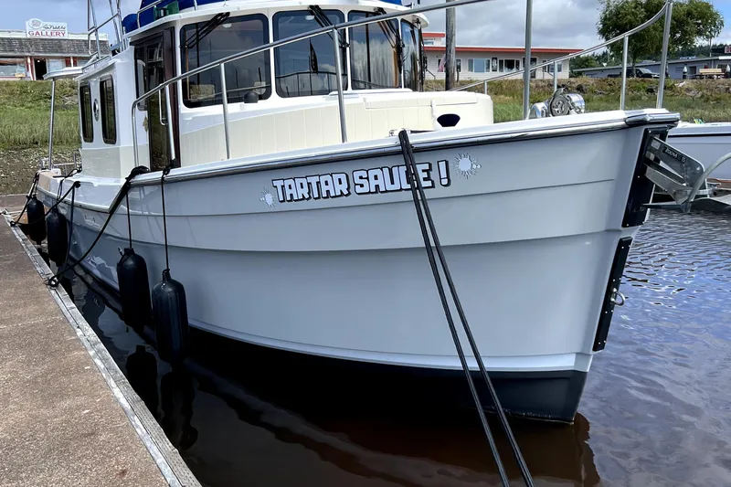 Yacht Photos Pics 2021 Ranger Tugs R-31 CB boat named "Tartar Sauce" docked at marina.