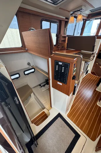  Yacht Photos Pics Interior of 2021 Ranger Tugs R-31 CB with wood accents and modern design.