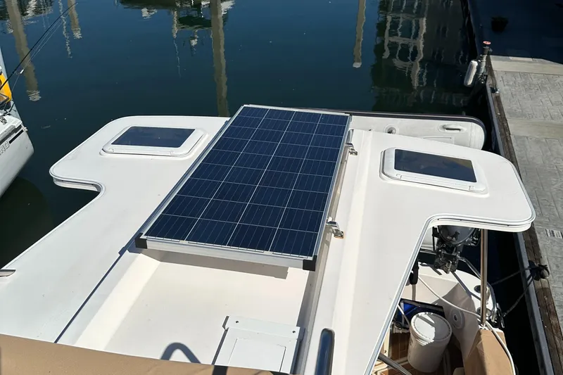  Yacht Photos Pics 2021 Ranger Tugs R-31 CB with solar panel on deck, docked at marina.