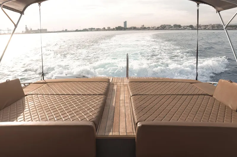 Aquaholic Yacht Photos Pics Luxury Sacs Strider 18 yacht, 2017 model, cruising with elegant deck seating.