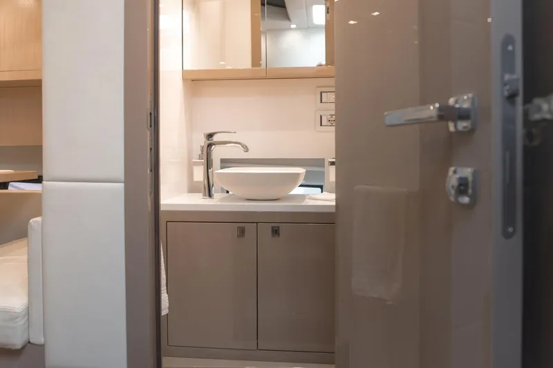 Aquaholic Yacht Photos Pics Interior of 2017 Sacs Marine Sacs Strider 18 yacht bathroom with modern sink and fixtures.