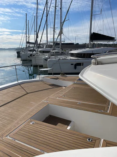  Yacht Photos Pics 2020 Leopard 43 Powercat docked, showcasing sleek deck design and marina backdrop.