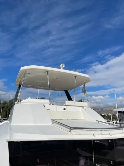  Yacht Photos Pics 2020 Leopard 43 Powercat yacht under a clear blue sky.