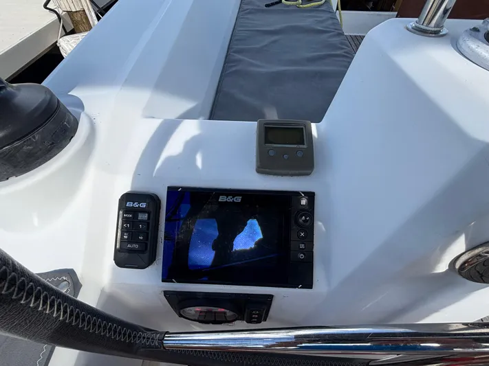 Rio Babe Yacht Photos Pics Cockpit of 2015 Beneteau Oceanis 35 with navigation equipment and controls.
