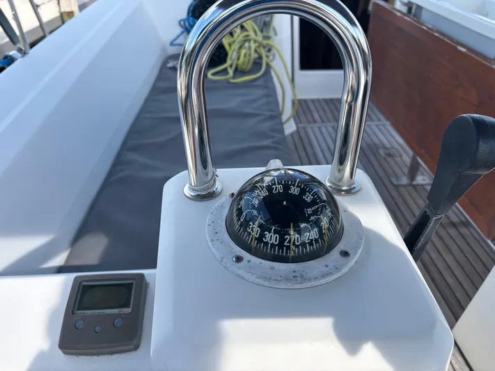 Rio Babe Yacht Photos Pics Compass and controls on a 2015 Beneteau Oceanis 35 sailboat deck.
