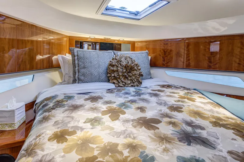 Pronto Yacht Photos Pics Luxurious bedroom interior of 2016 Riviera 5000 Sport Yacht with floral bedding.