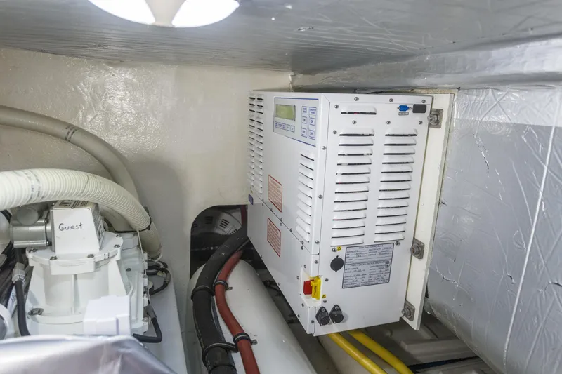 Pronto Yacht Photos Pics Engine room of 2016 Riviera 5000 Sport Yacht with electrical components and wiring.