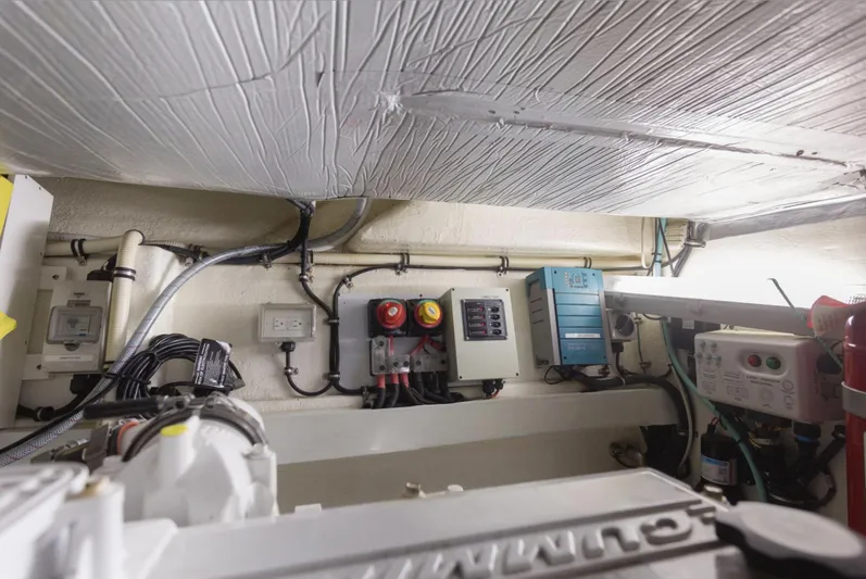 Pronto Yacht Photos Pics Engine room of 2016 Riviera 5000 Sport Yacht with electrical panels and wiring.