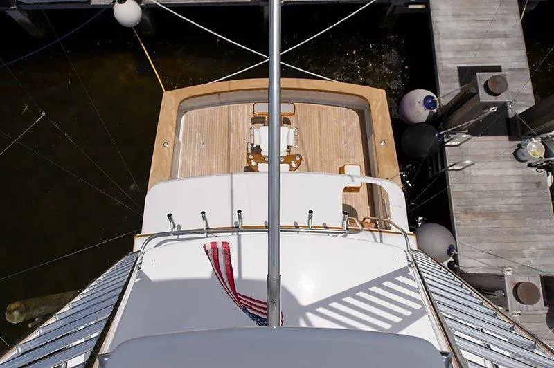 Ship's Cafe Yacht Photos Pics Aerial view of a 1987 Custom Carolina Merritt yacht at dock.