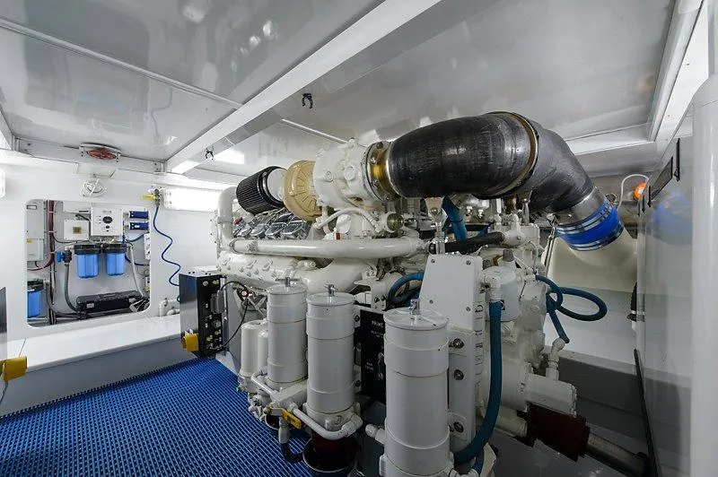 Ship's Cafe Yacht Photos Pics 1987 Custom Carolina Merritt Boatworks engine room, clean and well-maintained.