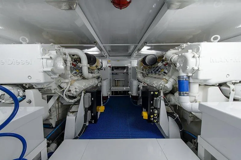 Ship's Cafe Yacht Photos Pics Engine room of a 1987 Custom Carolina Merritt boat, clean and well-organized.