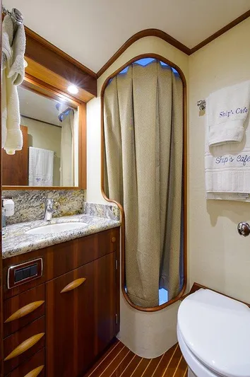 Ship's Cafe Yacht Photos Pics Luxurious bathroom on a 1987 Custom Carolina Merritt yacht.