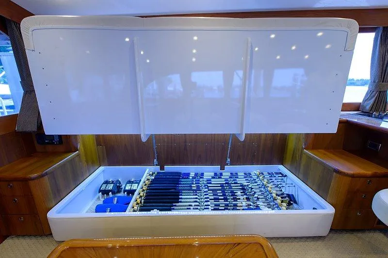 Ship's Cafe Yacht Photos Pics Fishing rod storage on 1987 Custom Carolina Merritt boat.