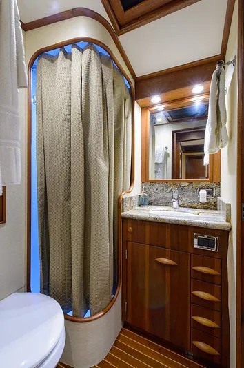 Ship's Cafe Yacht Photos Pics Luxurious bathroom in a 1987 Custom Carolina Merritt yacht.