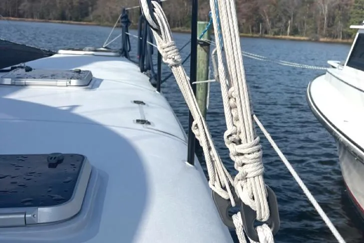 Shooting Star Yacht Photos Pics 2007 Morrelli & Melvin Shooting Star yacht docked on calm water.