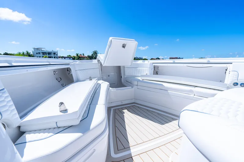  Yacht Photos Pics Luxurious interior of 2025 Intrepid 41 Panacea boat under clear blue sky.