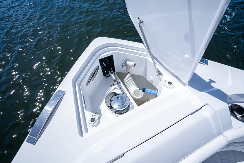  Yacht Photos Pics Open anchor compartment on 2025 Intrepid 41 Panacea boat, showing marine equipment.