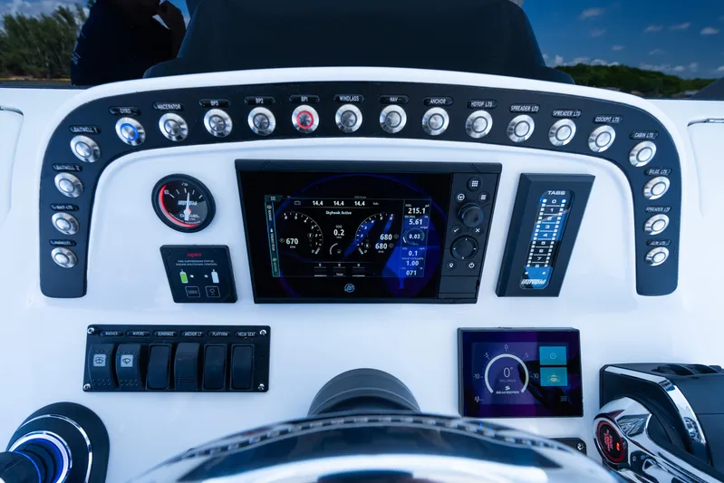  Yacht Photos Pics Control panel of 2025 Intrepid 41 Panacea boat with advanced navigation and monitoring systems.