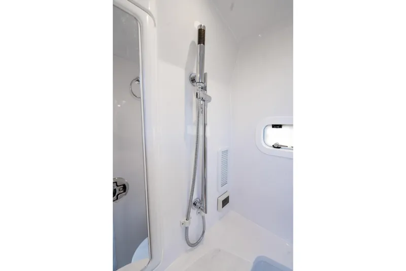  Yacht Photos Pics Shower area in 2025 Intrepid 41 Panacea boat, featuring sleek design and modern fixtures.
