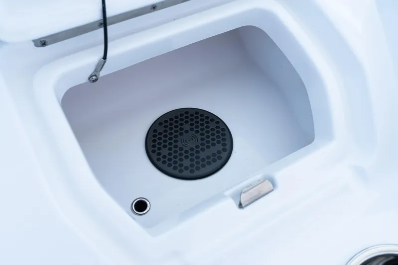  Yacht Photos Pics Storage compartment in 2025 Intrepid 41 Panacea boat, featuring a black circular vent.