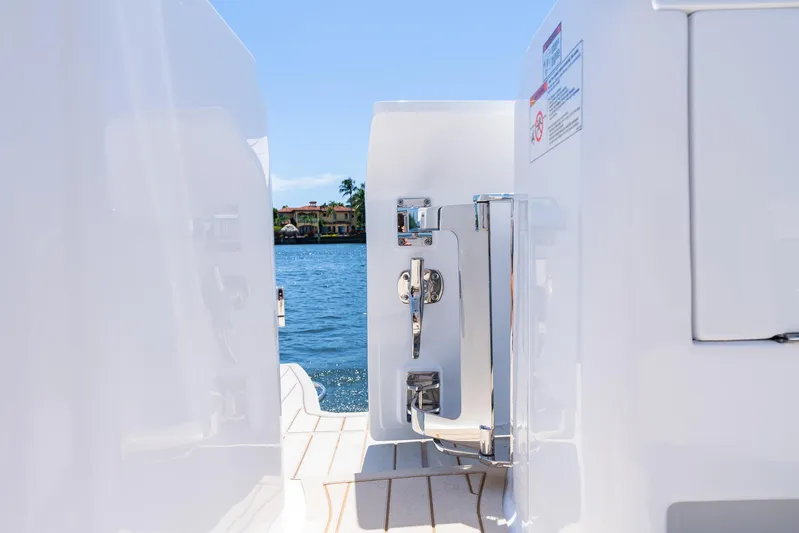  Yacht Photos Pics 2025 Intrepid 41 Panacea yacht detail with ocean view in the background.