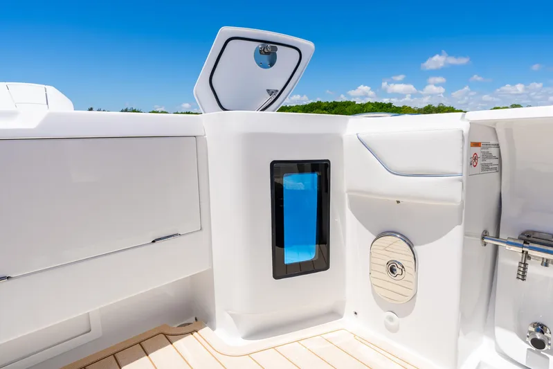  Yacht Photos Pics 2025 Intrepid 41 Panacea boat interior with sleek white design and modern features.