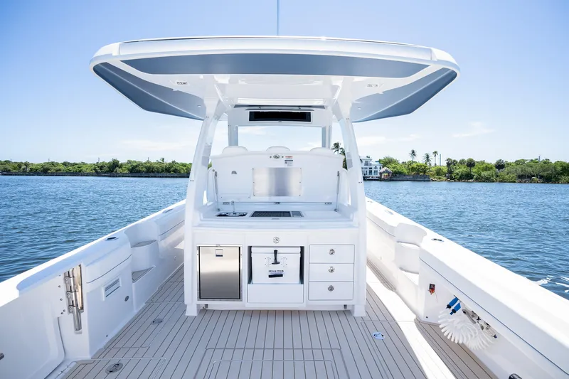  Yacht Photos Pics 2025 Intrepid 41 Panacea boat interior with sleek design and modern amenities on a sunny day.