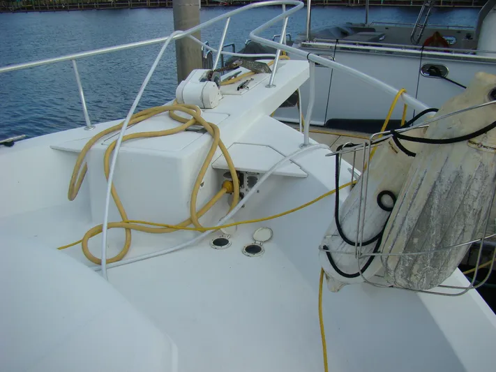 Good Chemistry Yacht Photos Pics 2001 Mainship 430 Trawler deck with ropes and equipment.