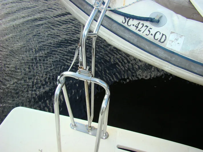 Good Chemistry Yacht Photos Pics Mainship 430 Trawler 2001 with dinghy and stainless steel ladder.