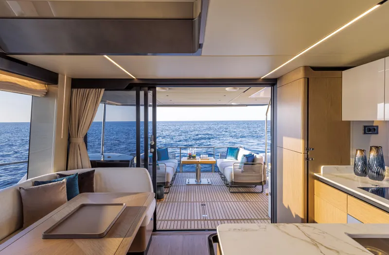  Yacht Photos Pics Luxurious interior of 2026 Absolute 60 Fly yacht with ocean view.