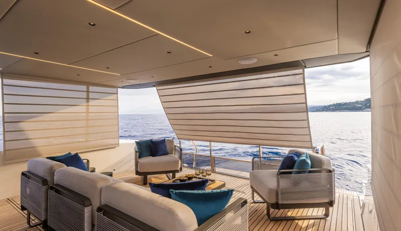 Yacht Photos Pics Luxurious 2026 Absolute 60 Fly yacht interior with ocean view and elegant seating.