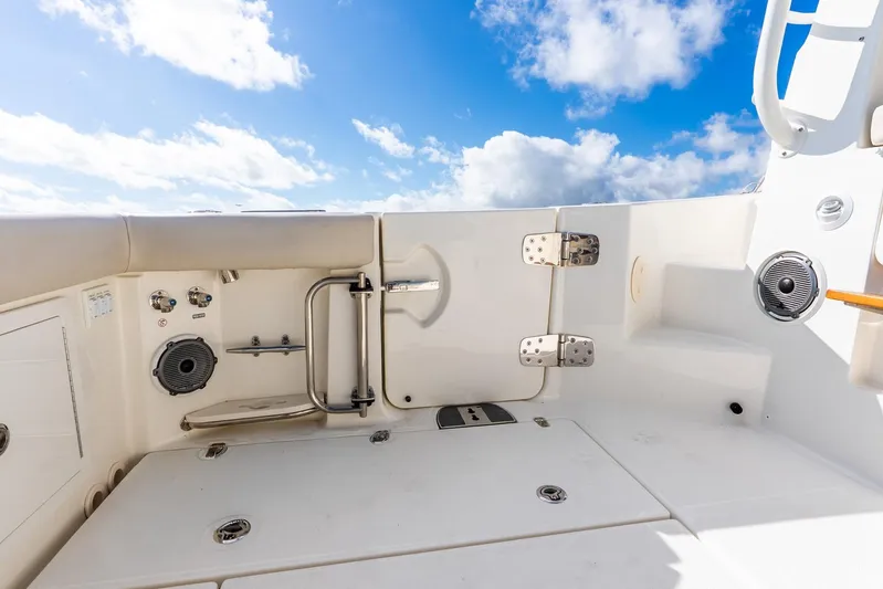 True Companion Yacht Photos Pics 2024 Boston Whaler 405 Conquest boat deck with blue sky background.