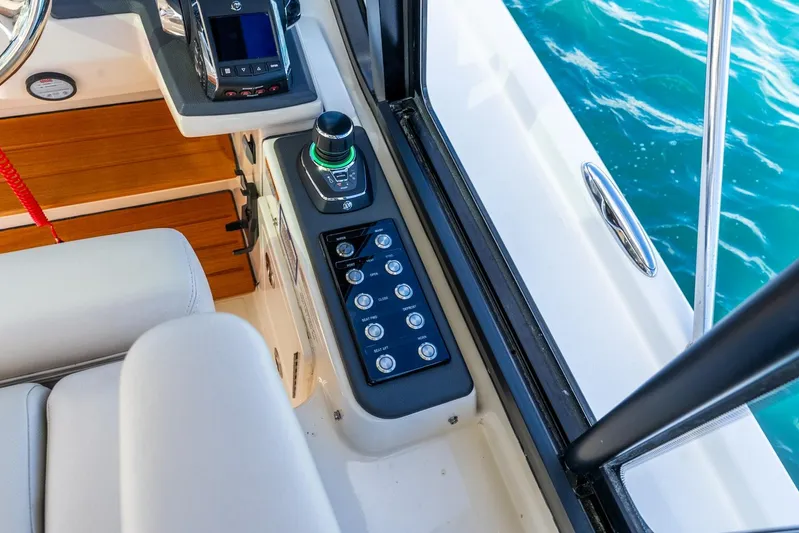True Companion Yacht Photos Pics Control panel of 2024 Boston Whaler 405 Conquest boat, featuring joystick and buttons.