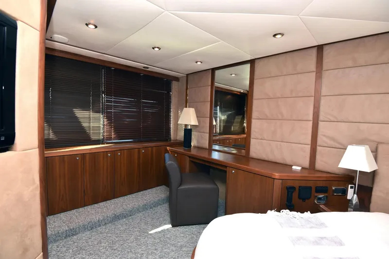 Bar&co Yacht Photos Pics Luxurious interior of 2008 Sunseeker Manhattan 73 yacht with elegant wood finishes and modern lighting.