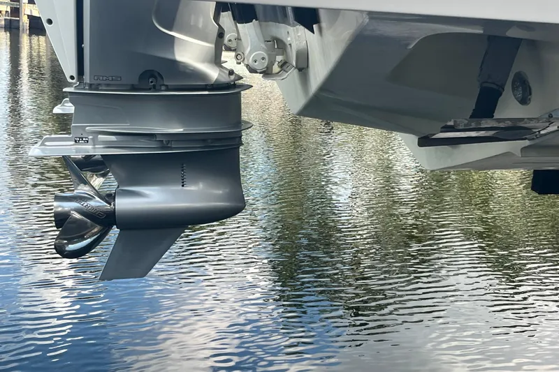 Sweet Spot Yacht Photos Pics Outboard motor of 2021 Axopar 37 Cross Cabin on water.