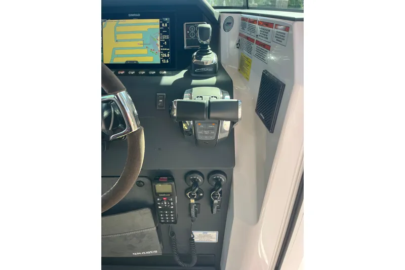 Sweet Spot Yacht Photos Pics 2021 Axopar 37 Cross Cabin helm with Simrad display and controls.