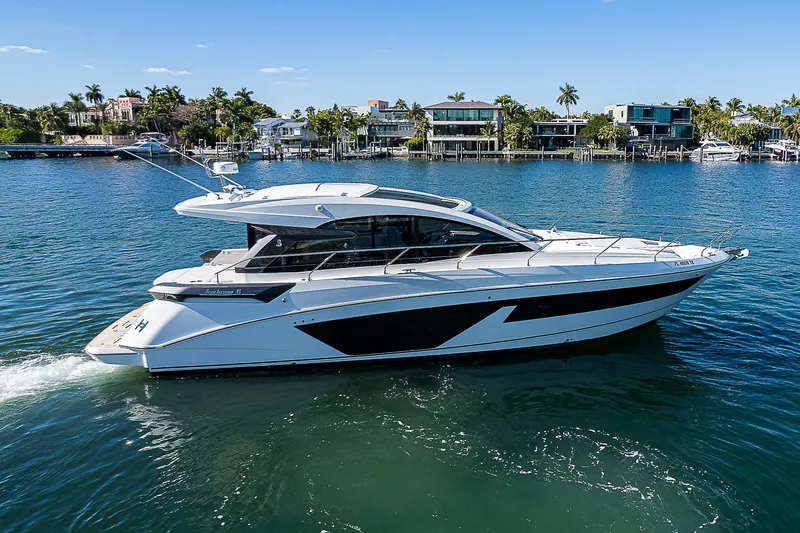  Yacht Photos Pics 2022 Beneteau Gran Turismo 45 yacht cruising on a sunny day.