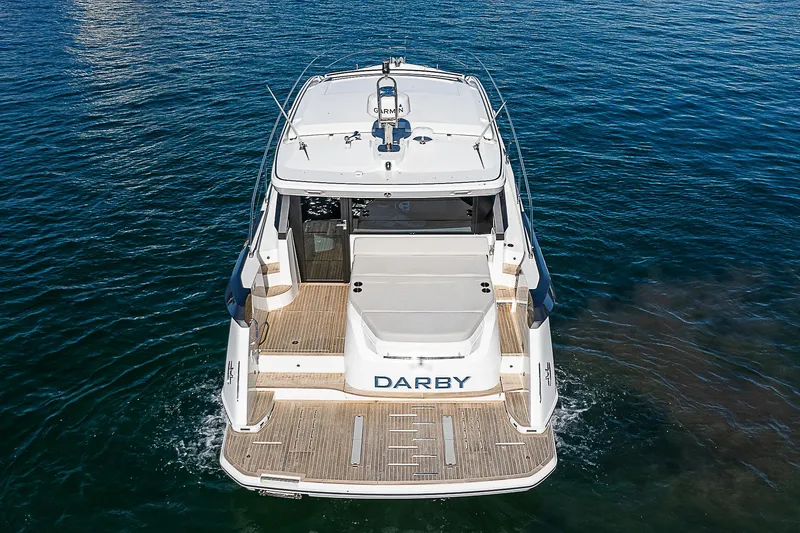  Yacht Photos Pics 2022 Beneteau Gran Turismo 45 yacht on water, rear view.