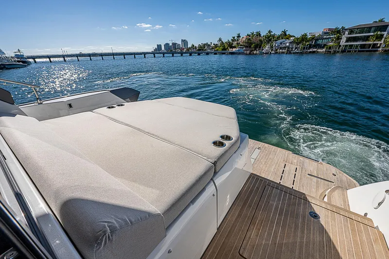  Yacht Photos Pics 2022 Beneteau Gran Turismo 45 yacht with sun deck on the water.