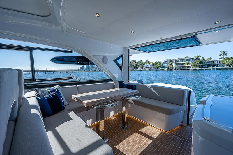 Yacht Photos Pics Interior of 2022 Beneteau Gran Turismo 45 yacht with waterfront view.