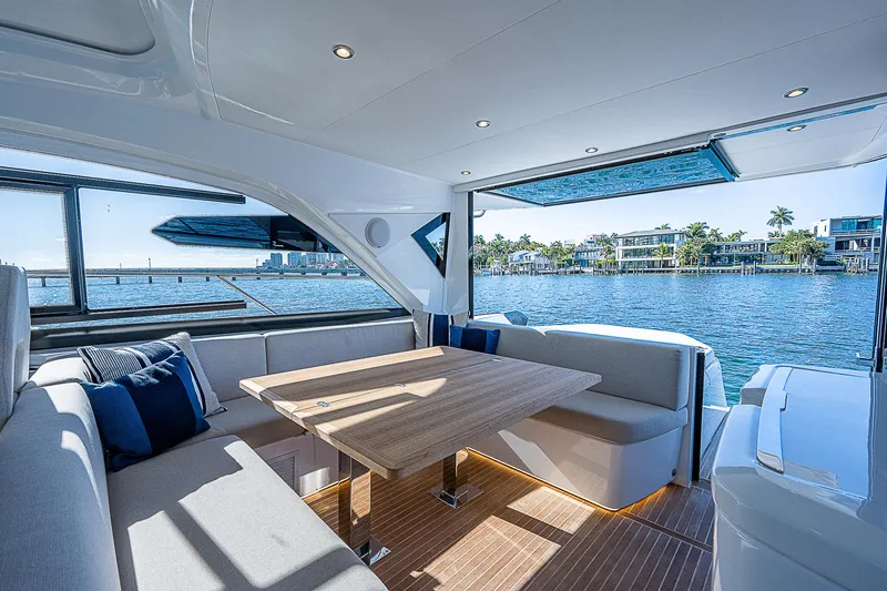  Yacht Photos Pics 2022 Beneteau Gran Turismo 45 yacht interior with waterfront view