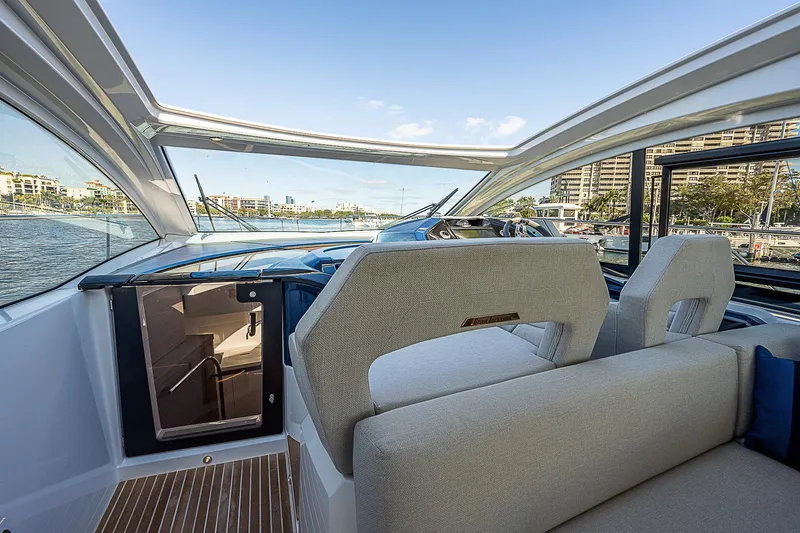  Yacht Photos Pics Interior view of 2022 Beneteau Gran Turismo 45 yacht with panoramic windows.
