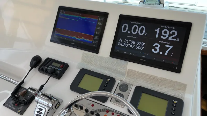 Siboney Yacht Photos Pics Cabo 40 Express 2004 helm with GPS displays.