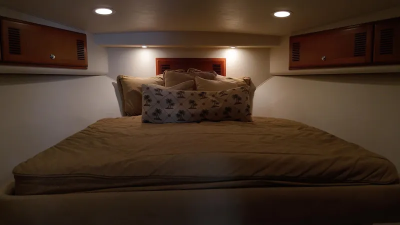 Siboney Yacht Photos Pics Interior of 2004 Cabo 40 Express with cozy bed.