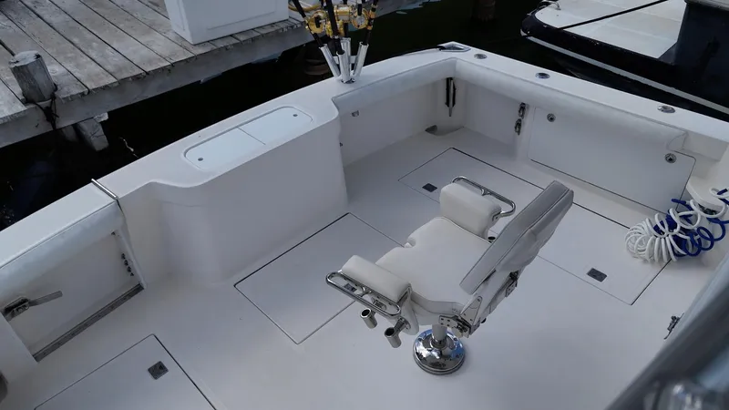 Siboney Yacht Photos Pics Cabo 40 Express 2004 fishing chair on boat dock.