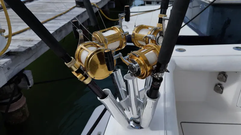 Siboney Yacht Photos Pics Fishing rods on a 2004 Cabo 40 Express boat.
