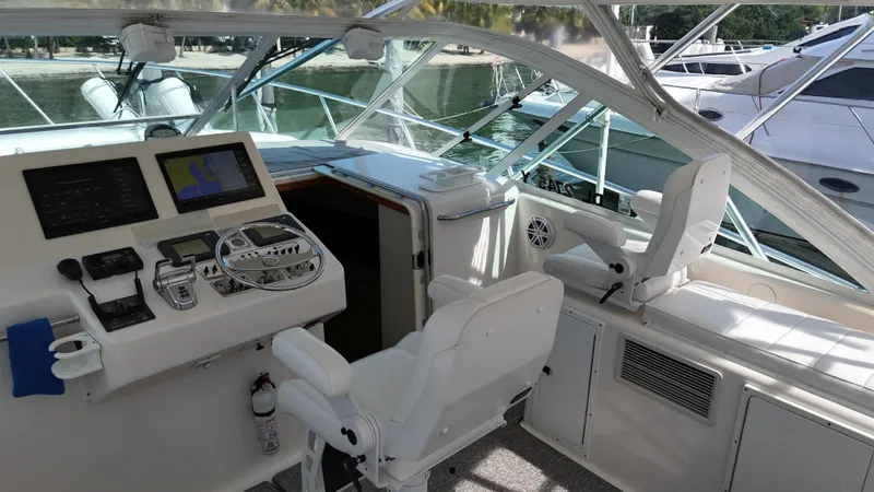 Siboney Yacht Photos Pics Interior of 2004 Cabo 40 Express yacht cockpit.