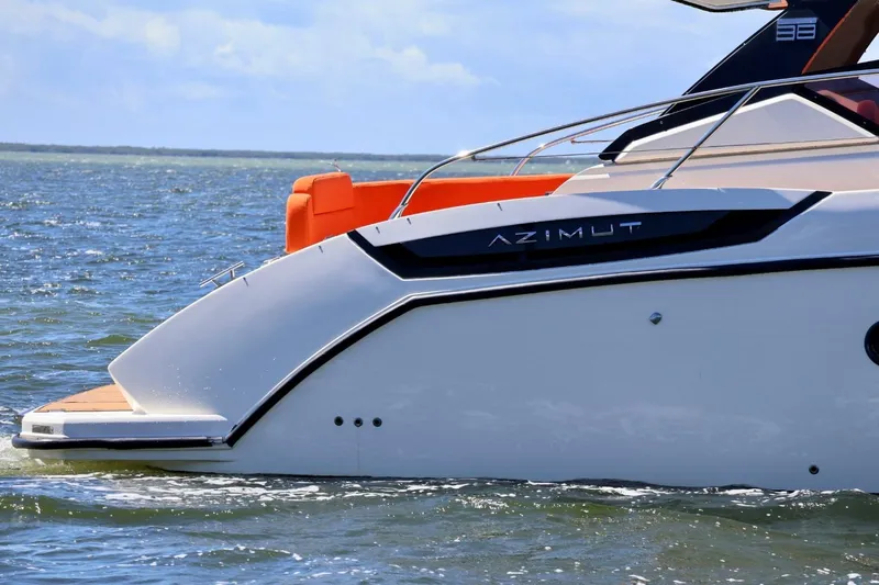  Yacht Photos Pics 2014 Azimut 38 yacht on water, showcasing sleek design and luxury features.