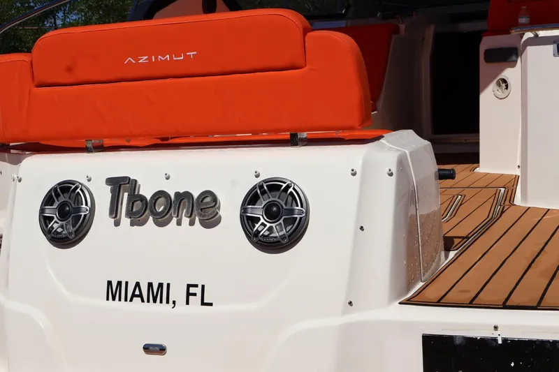  Yacht Photos Pics 2014 Azimut 38 yacht with orange seating, named "Tbone," docked in Miami, FL.